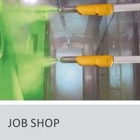 Job shop showing green powder coating spraying system