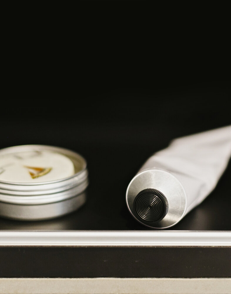 Tubes-and-cans-charcoal-toothpaste-in-glass-s-Envato.JPG