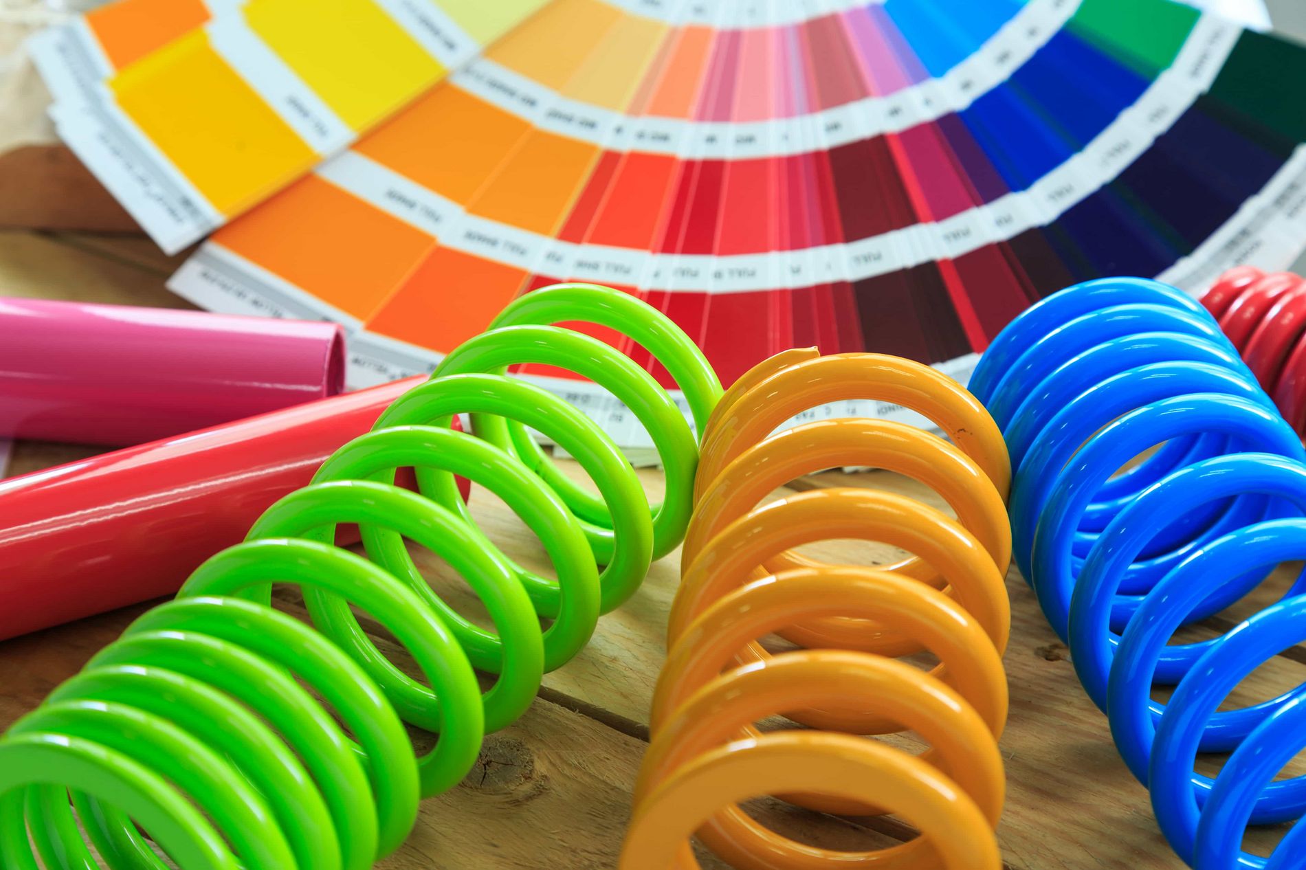 powder coated springs next to a color card