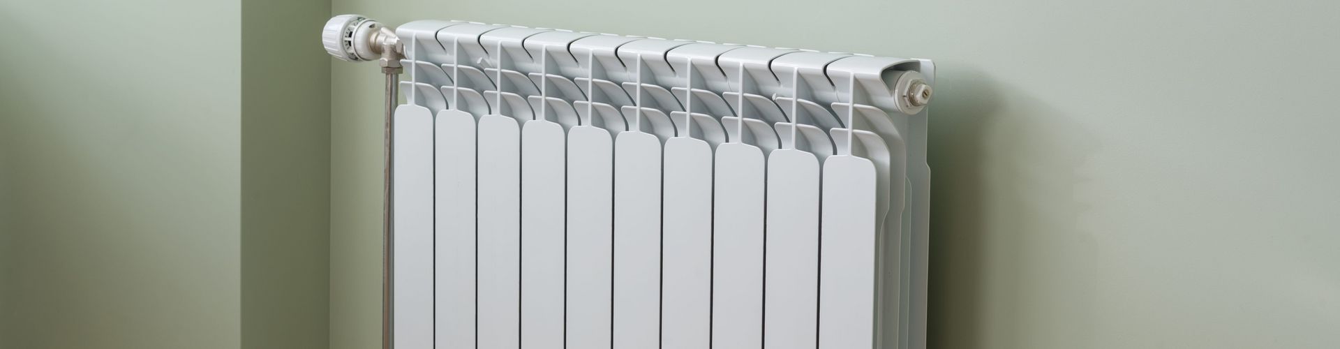 heating-radiator-white-radiator-in-an-apartment-2023-11-27-05-34-35-utc.jpg